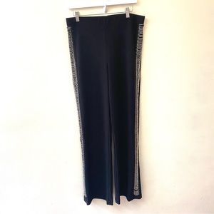 Cartise black pull on stretch knit silver chain detailing on the legs size 8